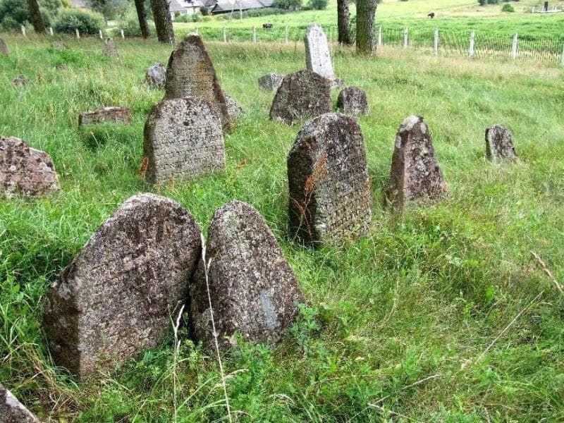 Dolginovo. Former synagogue building and the Jewish cemetery
